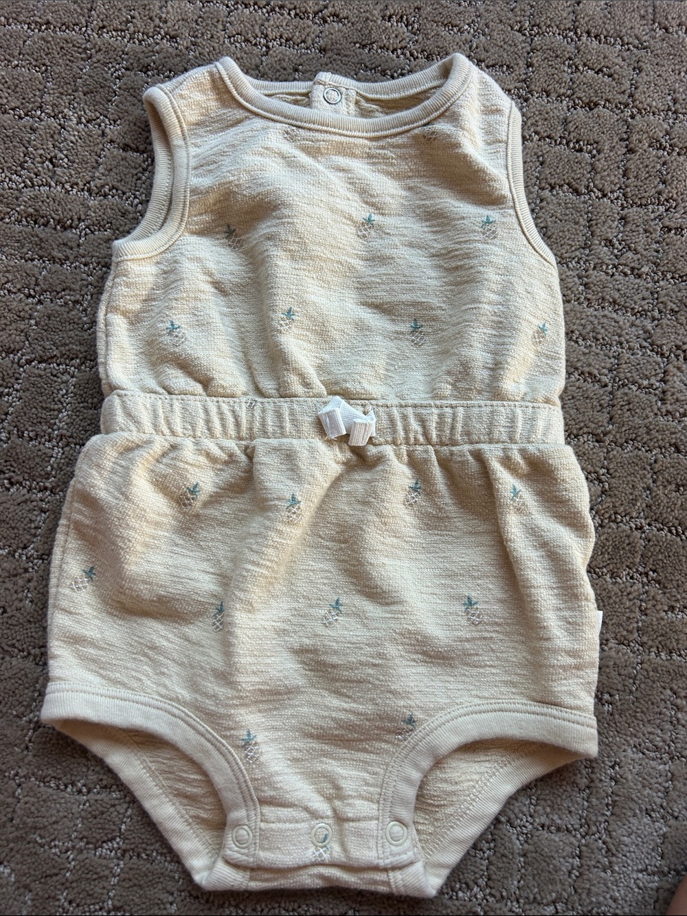 Cream Baby One-Piece Romper with Tiny Blue Floral Accents